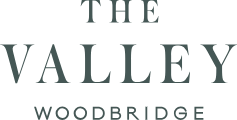The Valley Woodbridge logo